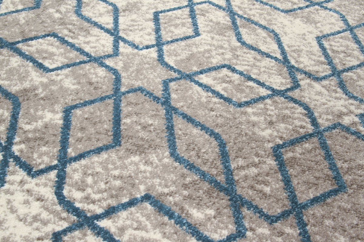 Alfombra color crudo con motivos azules 160 x 230 cm SOHO