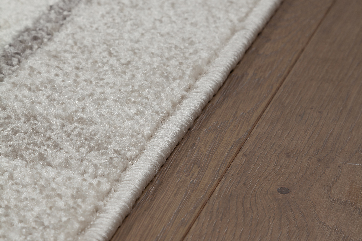 Alfombra rectangular beige con motivos 150 x 220 cm IRENE