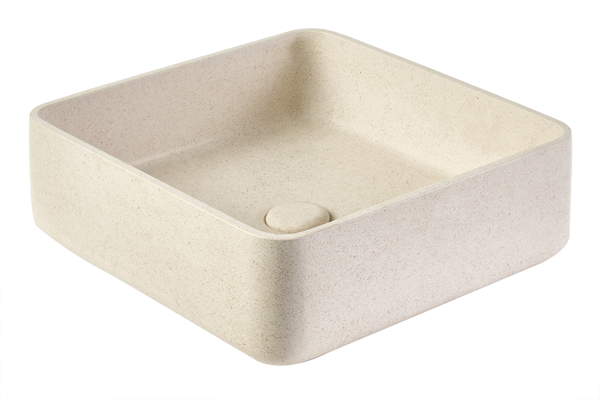 Lavabo cuadrado de piedra natural beige, vista de 3/4, acabado mate.