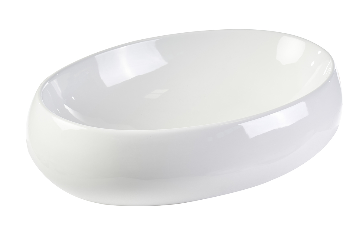 Lavabo ovalado de cer�mica blanca visto en 3/4, dimensiones 60,5 cm