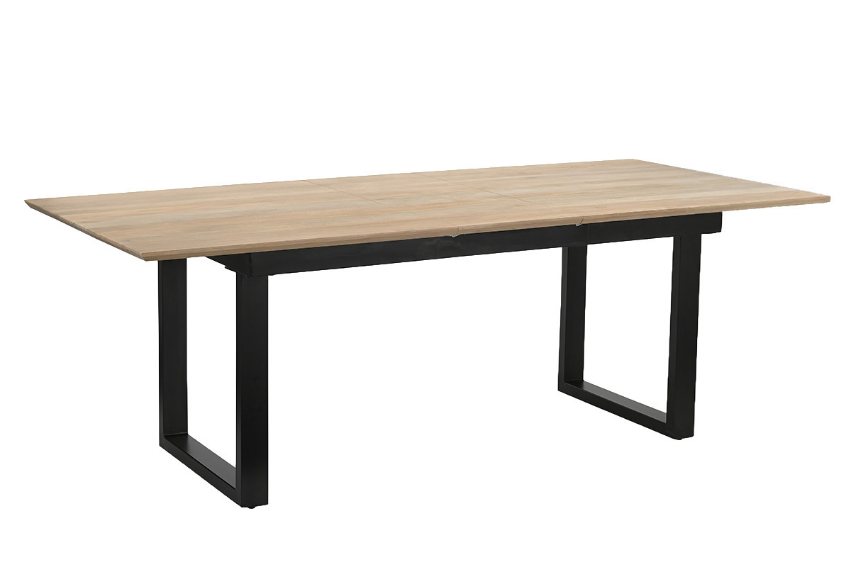 Mesa de comedor extensible de madera clara de mango y metal negro, vista en tres cuartos