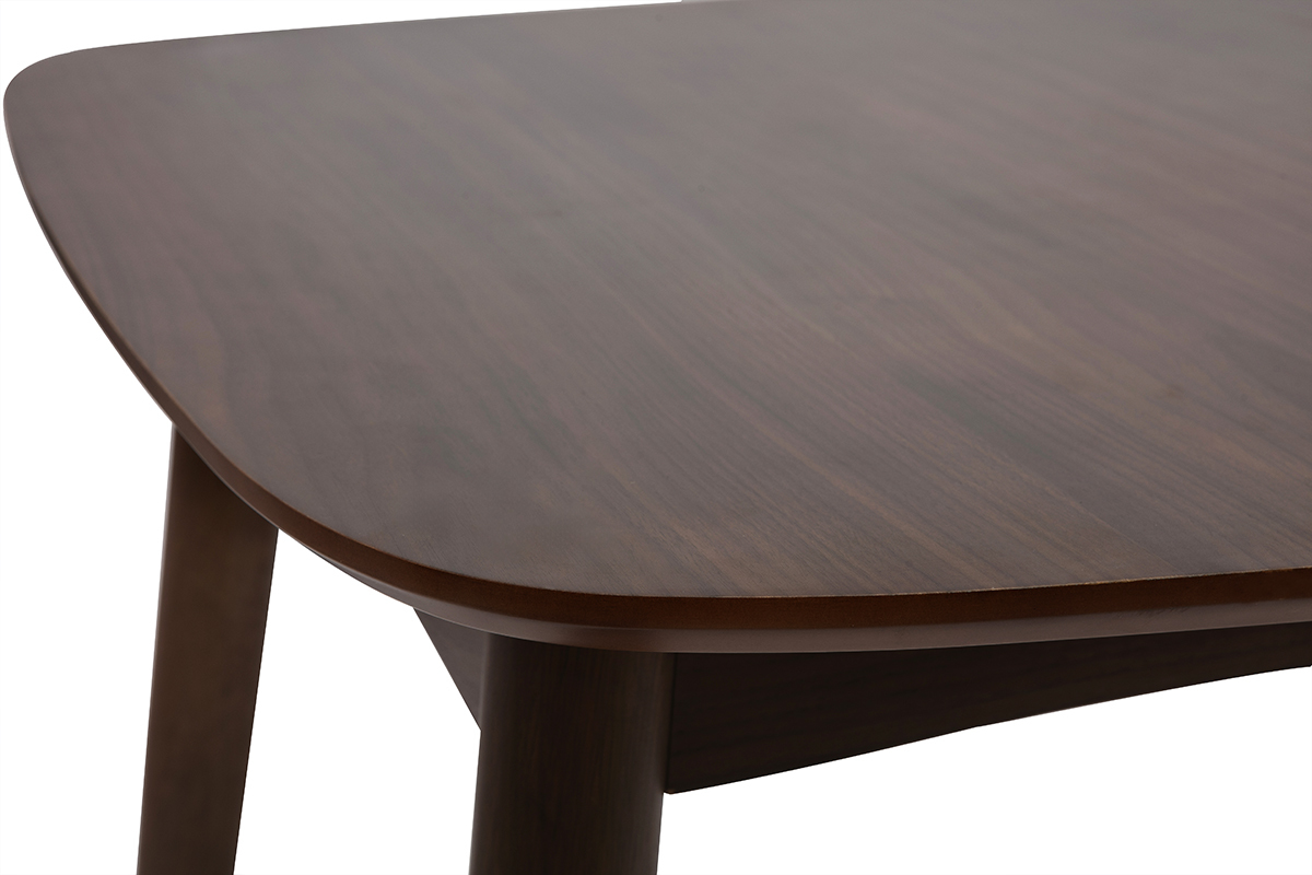 Mesa de comedor extensible de nogal, vista en detalle del tablero y los bordes redondeados.