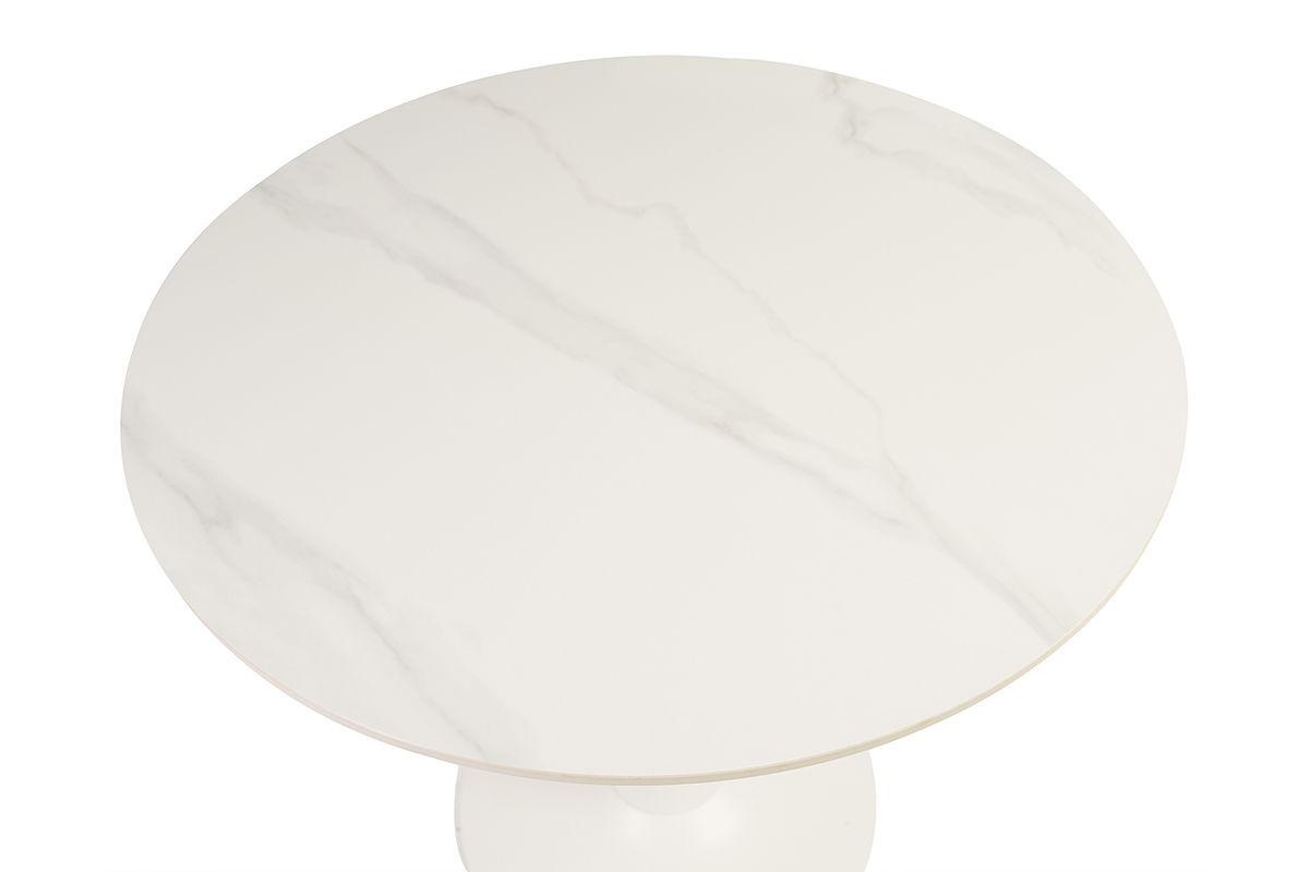 Mesa redonda de cermica blanca vista desde arriba.