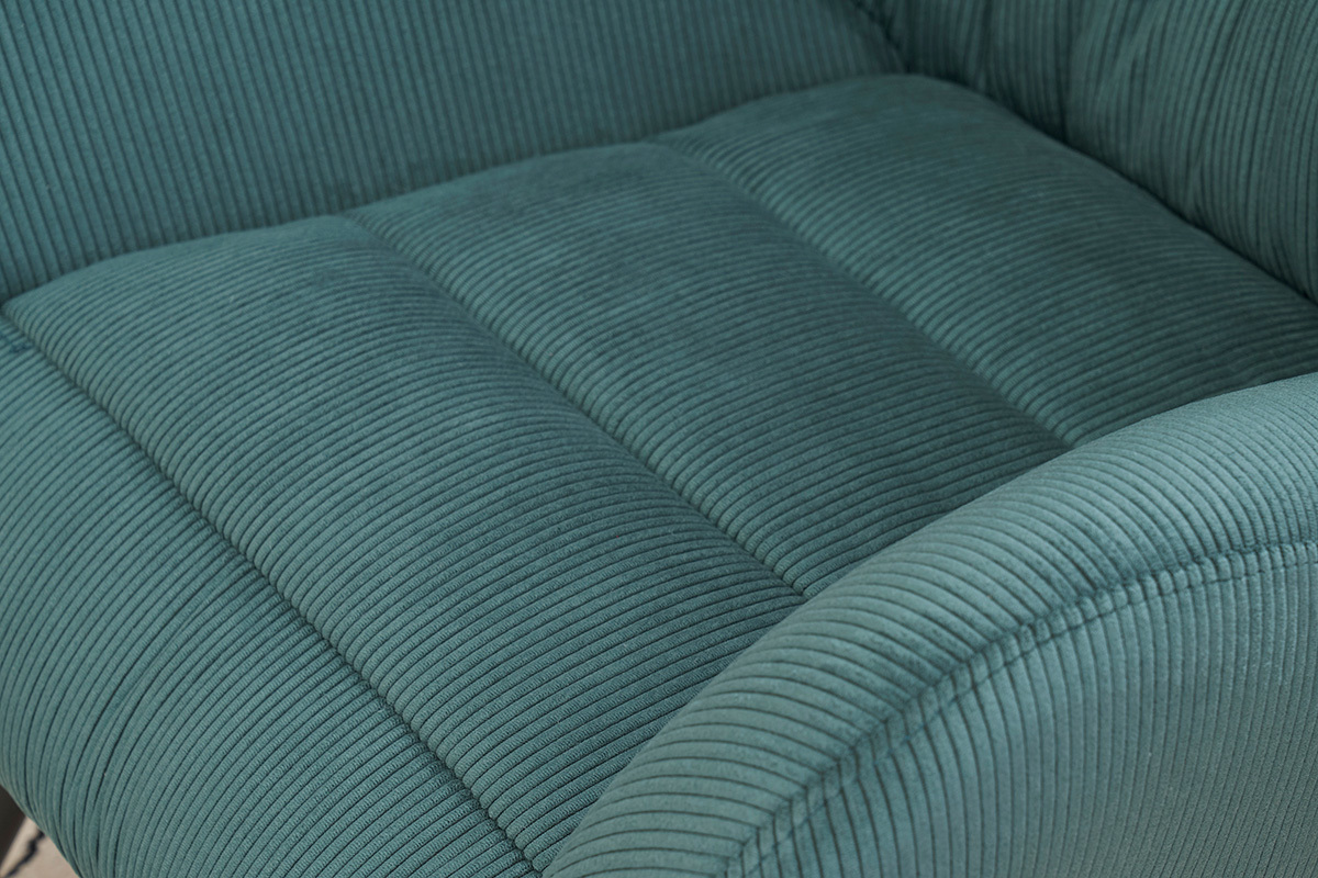 Primer plano de la tela de pana verde del sill�n ZOE.