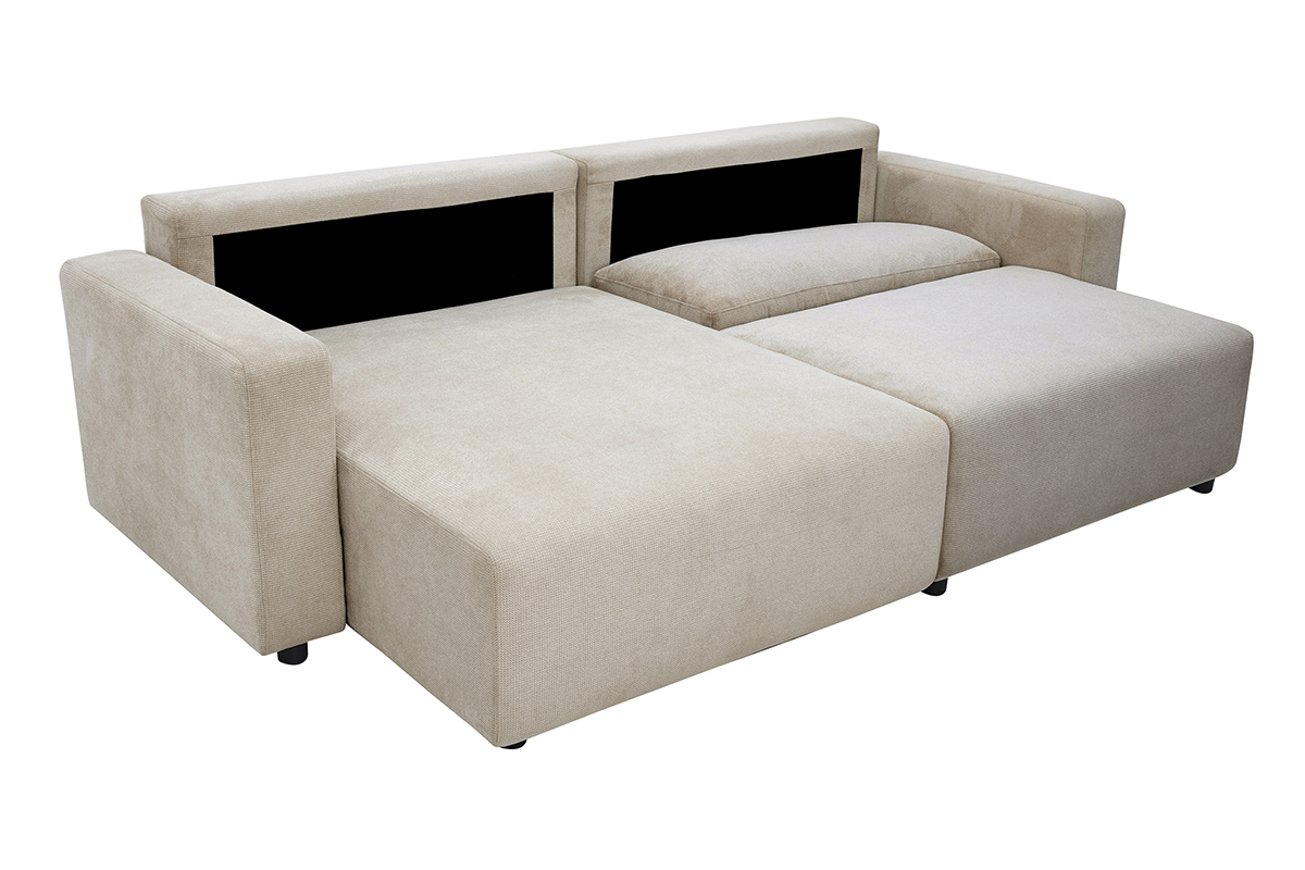 Sof� esquinero convertible reversible beige NESTO, vista de 3/4, con arc�n de almacenamiento integrado.