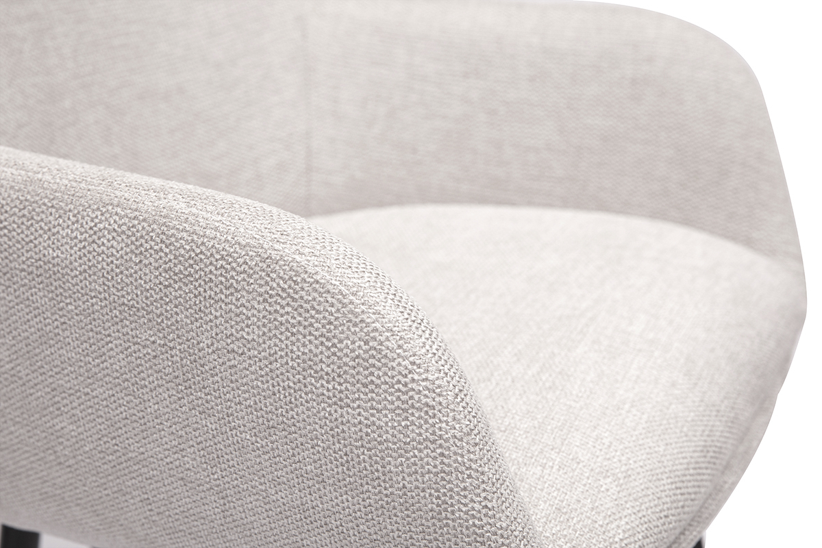 Primer plano de un taburete de bar de tela beige con efecto terciopelo texturizado.